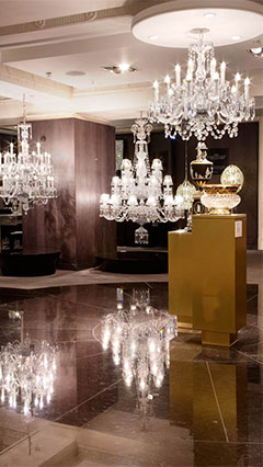 Chandeliers at Harrods, UK with Philips LED lamps in the shape of a candle 